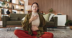 Woman, relax or breathing with meditation for mindfulness or spiritual wellness in home. Female person, exercise or lotus pose with eyes closed for inner peace, balance or awareness on floor in house
