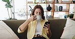 Coffee, phone and relax with woman on sofa in living room of home for social media post or update. App, drink and search on mobile with person in apartment for break, communication or me time
