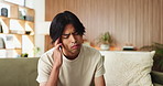 Stress, headache and Asian man in home with pain, brain fog and massage temple while thinking. Migraine, reflection and sick person in living room with vertigo, mental health challenge or tension