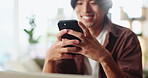 Phone, hands and man in home with texting, social media or connection on mobile app in living room. Technology, typing and male person with cellphone for chatting with online networking in house.