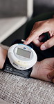 Doctor, patient and hands in medical clinic with blood pressure machine, wellness and healthcare checkup. Nurse, people and digital tech with equipment, test results and diagnosis for hypertension.