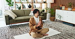Man, zen and breathing with namaste for meditation, spiritual wellness or mindfulness in home. Calm, male person or exercise for inner peace, chakra balance or healing on yoga mat or floor in house