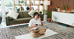 House, smartphone and man on yoga mat, headphones and digital app for audio subscription. Above, cellphone and Asian person in lounge, podcast and listening to music, sound and radio with meditation