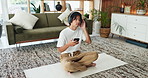 Relax, cellphone and man on floor, headphones and digital app for audio subscription. House, smartphone and Asian person in lounge, radio and listening to music, sound and break with connection
