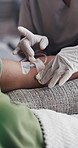 Doctor, hands or injection with IV drip for blood infusion, vitamins or immune booster in clinic. Closeup, people or nurse helping patient with needle prep for detox, nutrition or healthcare recovery