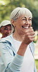 Fitness, cardio class and old woman at park for training, wellness and steps in retirement. Smile, elderly person and workout outdoor with low impact exercise for mobility, energy and brisk walking