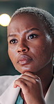 Black woman, thinking and night at office with review, project management or insight at insurance company. African person, broker or advisor with perspective, feedback or risk assessment at agency