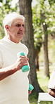 Fitness class, dumbbells and old man walk in park for cardio, muscle development and health. Elderly group, weightlifting or steps in nature for strength training, breathing or exercise in retirement