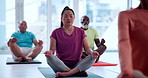 Senior class, fitness or meditation with coach for breathing exercise, health or wellness together. Elderly people, team or instructor in lotus pose for inner peace, yoga lesson or spiritual healing