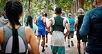 Fitness, athlete group and running at park for marathon practice, endurance challenge and workout. Runner club, back of people or jog together in nature for pace training, cardio exercise or wellness