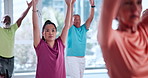 Pilates class, mature people and fitness with balance, spiritual wellness and arms up in gym. Woman, retirement and group stretching in health club with warm up for yoga, mobility and elderly care