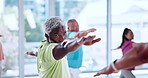 Yoga class, mature people and fitness with mobility, spiritual wellness and warrior pose in gym. Man, retirement and group balance in health club with warm up for pilates, stretching and elderly care
