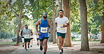 Running, marathon and group of men outdoor for race, endurance challenge and fitness event. Sports, athlete and people in park for runners contest, competition and exercise goal for cardio workout