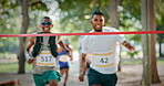 Marathon, people or running to finish line at park for fitness challenge, competition victory or contest. Champions, race or winning group with celebration at sports event for success or cardio goals