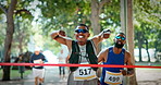 Marathon, man or running to finish line with celebration for fitness challenge, competition or victory. Excited, people and athlete with fist pump at sports event for contest success and achievement