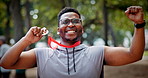 Man, medal and winner with face for trail running competition in forest with fitness goals. Athlete, person and champion with fist pump, success or excited in portrait with achievement in woods