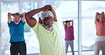 Stretching, fitness and class with old man in studio for mobility workout, health and joint friendly exercise. Wellness, learning and senior training group with people in club for warm up and hobby