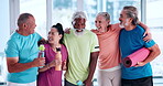 Happy, fitness and class with old people in studio for mobility workout, health and joint friendly exercise. Wellness, support and senior training group with friends in club for talking and hobby