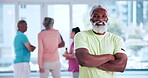 Face, fitness and arms crossed with old man in studio for mobility workout, health or joint friendly exercise. Wellness, learning or senior training group with portrait of person for smile and hobby