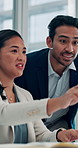 Happy woman, man and review with computer for project, insight and point at insurance company. Business people, team and risk management with typing, collaboration or feedback with smile at agency