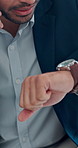 Phone call, watch and businessman in office for deal, negotiation or contact for investment. Cellphone, time management and male financial advisor on mobile discussion for feedback on budget plan.