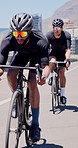 Cycling, team and men on bike outdoor for practice, competition and active on road for journey. City street, cyclist and people on bicycle for sport tournament, travel and eco friendly transport