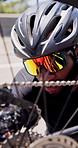 Man, bicycle repair and exercise in city with inspection for chain, gear and problem solving in street. African person, cycling and fix bike with sunglasses, fitness or safety for training in town