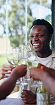 Toast, friends and man in restaurant with alcohol for social gathering, reunion and wine tasting event. Talking, weekend and people with glass, drinks and cheers for bonding, connection and celebrate