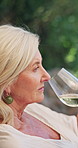 Wine tasting, relax and smell with old woman outdoor for retirement, flavor profile and travel. Weekend break, alcohol drink and hospitality with senior person at winery for beverage and aroma