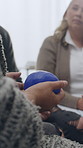 People, support group and hands with stress ball for therapy, counselling or rehabilitation. Team, community and passing object in circle, unity or solidarity for social equality, chance or talk