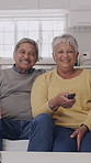 Old couple, laugh and watching tv on couch in home with remote control, bonding and relax in lounge. Elderly man, woman and partner with connection, streaming or subscription for movies in retirement