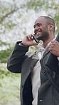 Excited, talking and businessman with phone call in park, acquisition deal success and achievement. Contract agreement, bokeh and investor with mobile for good news, smile and celebrate in nature