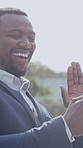 Phone, video call and wave with business black man in city for communication or commute to work. Conversation, excited and laughing with greeting of happy African employee outdoor for discussion