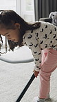 Cleaning, kid and vacuum carpet in house for dirt removal, hygiene and learning responsibility. Housekeeping, independent girl and appliance for domestic chores, dust prevention and child development