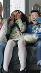Children, friends and watching tv with shock on sofa for excited, wow or cover eyes at house. Kids, group and surprise on couch with snacks, streaming and subscription for movies in living room