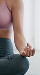 Yoga, mudra or hands in home with meditation, calm practice or mindfulness in wellness activity. Inner peace, lotus or person in house with mat, zen or mindset improvement for holistic health.