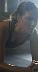 Woman, sweat and plank in gym with exercise, strength training and control breathing for wellness. Active, female person and balance on floor with stability, fitness challenge and workout for abs.