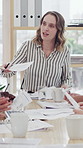 Business people, meeting and woman in office with paperwork, brainstorming and discussion for feedback. Creative agency, project management and conversation for planning, review and collaboration