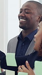 Business people, meeting or discussion with sticky note for schedule planning, agenda or tasks. Group, employees or colleagues thinking with ideas on glass board for project deadline or brainstorming