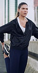 Thinking, woman and stretching for fitness in city with vision, exercise and sports preparation. Reflection, female person and getting ready with muscle warm up, cardio training and workout challenge