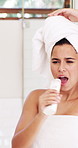 Singing, dance and towel with woman in bathroom of home for cleaning, hygiene or morning routine. Energy, fun and music with happy person in shower of house for fantasy karaoke or natural skincare