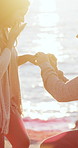 Happy couple, marriage or proposal with ring on beach for relationship, commitment or vow in nature. Woman, man and love with jewelry, hug or sun for romance, promise or start together on ocean coast