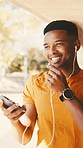 Fitness, phone and man with earphones for call, speaking or recording message on break outdoor. Smile, voice note and black person with mobile for communication, audio or sports feedback with mic
