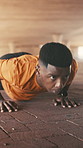 Fitness, push up or black man in parking lot with endurance, workout or cardio strength in intense training. Challenge, balance or person with body press, exercise or core stability in muscle gain.
