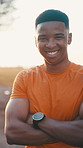 Face, fitness and black man with arms crossed outdoor for wellness, health and happiness at sunset. Portrait, cardio and person with confidence, runner and athlete in nature for sports with flare