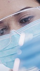 Scientist, woman and test tube in lab for research, medical study and genetic mapping with ppe. Science, tools and person pour liquid for DNA experiment, blood sample or innovation with face mask