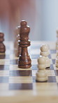 Chess, hand and people with strategy, timelapse and problem solving in competition in house. Game, contest and play with chessboard for challenge, hobby and versus with match together at home
