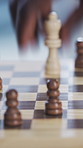 Chess, hand and challenge with strategy, timelapse and problem solving in competition in house. People, contest and play with chessboard for game, hobby and versus with match together at home