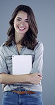 Arms crossed, face and tablet with designer woman in studio for creative research or planning. App, smile and web development with happy design professional on gray background for digital checklist