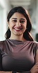 Face, smile and business woman in company, public relations and confidence with pride. Portrait, about us and happy professional, pr agent and worker with arms folded for career development in India